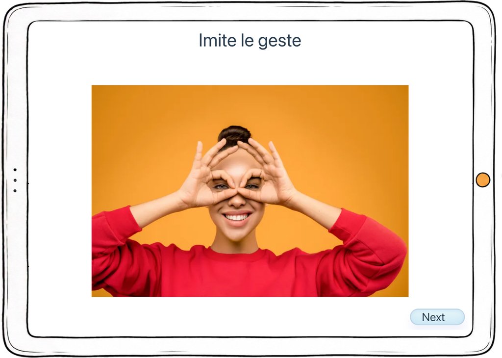 Capture d’écran de l’exercice « Imite le geste » : une photographie de geste à reproduire, mains formant des lunettes.